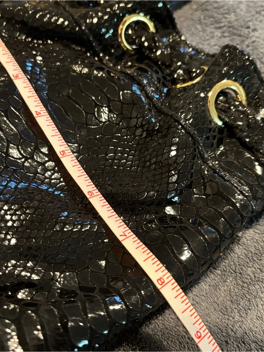 Michael Kors python-embossed black patent crossbody bag with gold hardware